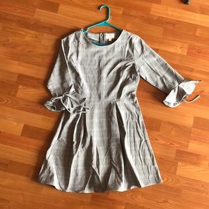 Essell Plaid Flair Mini Dress from Francesca’s